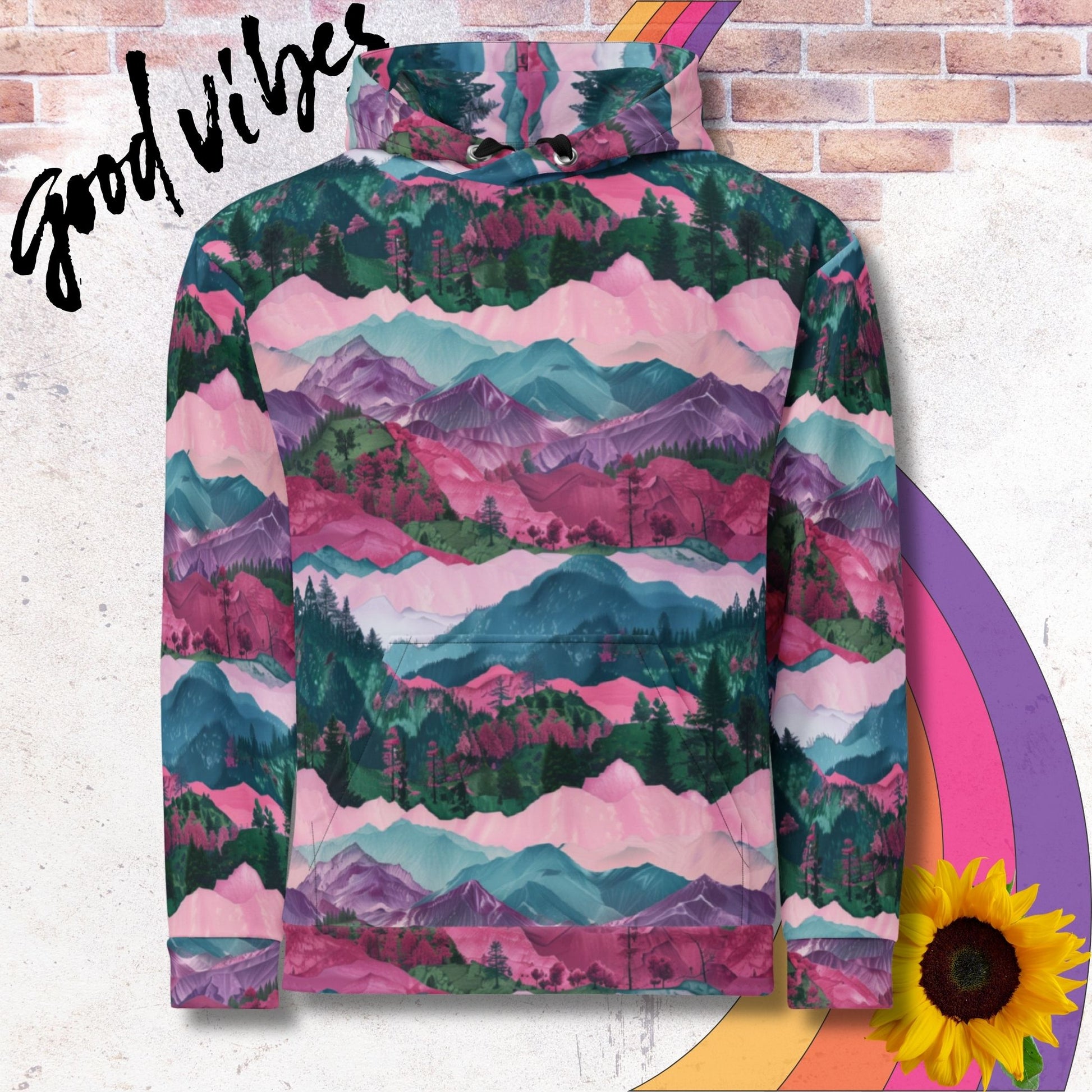 All over print unisex hoodie. Pink and green layers of hills and mountains lined with trees