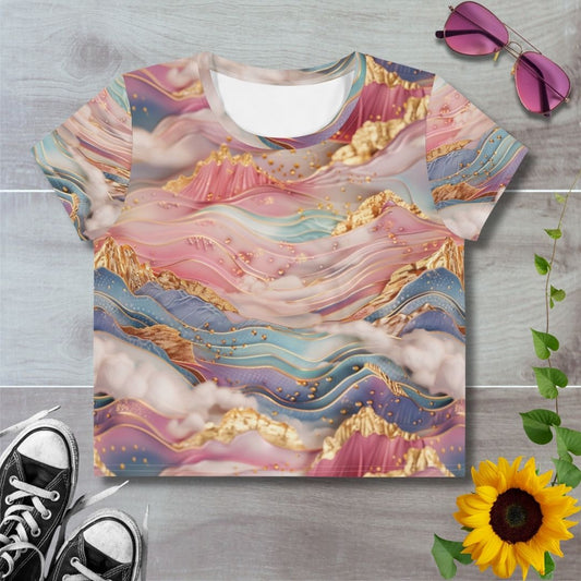 Women's all over print cropped t-shirt. Pink layered mountain like pattern with peaks of gold foil