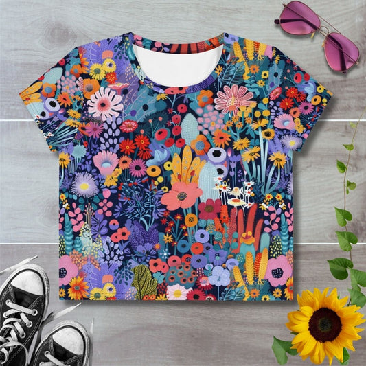 Women's all over print cropped t-shirt. Bright colorful floral garden