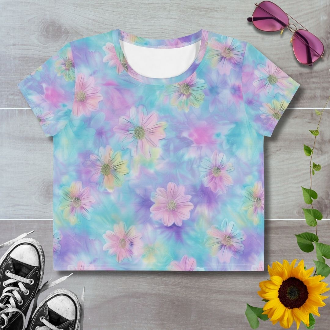 Women's all over print cropped t-shirt. Floral pink on pastel blue and purple tie dye, mermaid-core, mermaid vibes