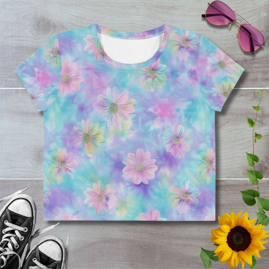 Women's all over print cropped t-shirt. Floral pink on pastel blue and purple tie dye, mermaid-core, mermaid vibes