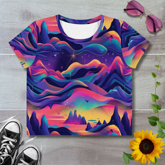 Women's all over print cropped t-shirt. Psychedelic vibrant colored alien landscape f rolling hills and layered colors