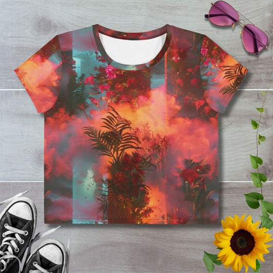Women's all over print cropped t-shirt. Red and orange tropical clouds with red and green foliage