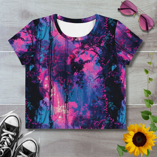 Women's all over print cropped t-shirt. pink and blue twilight skies amongst black jungle vines